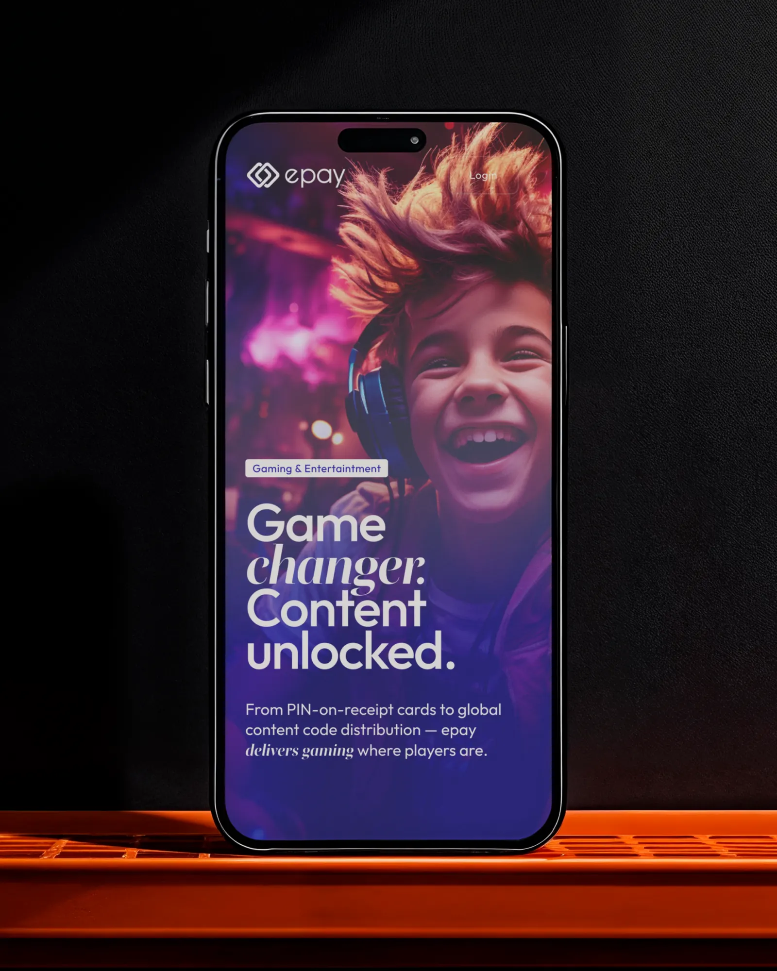 Phone showing the gaming page: “Game changer. Content unlocked.”