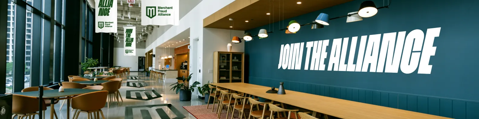 LinkedIn profile banner: an event lounge with Join the Alliance on the wall