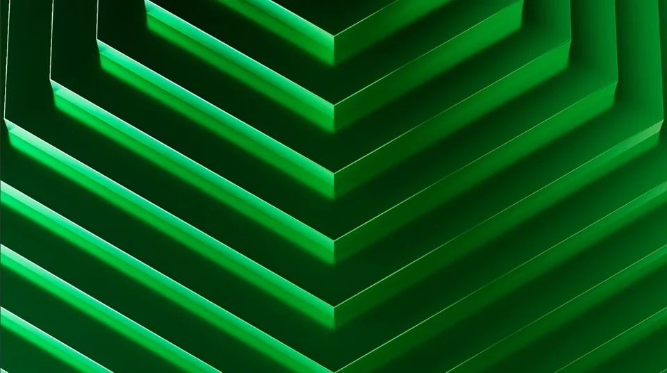 The shield outline repeated as layered green glass