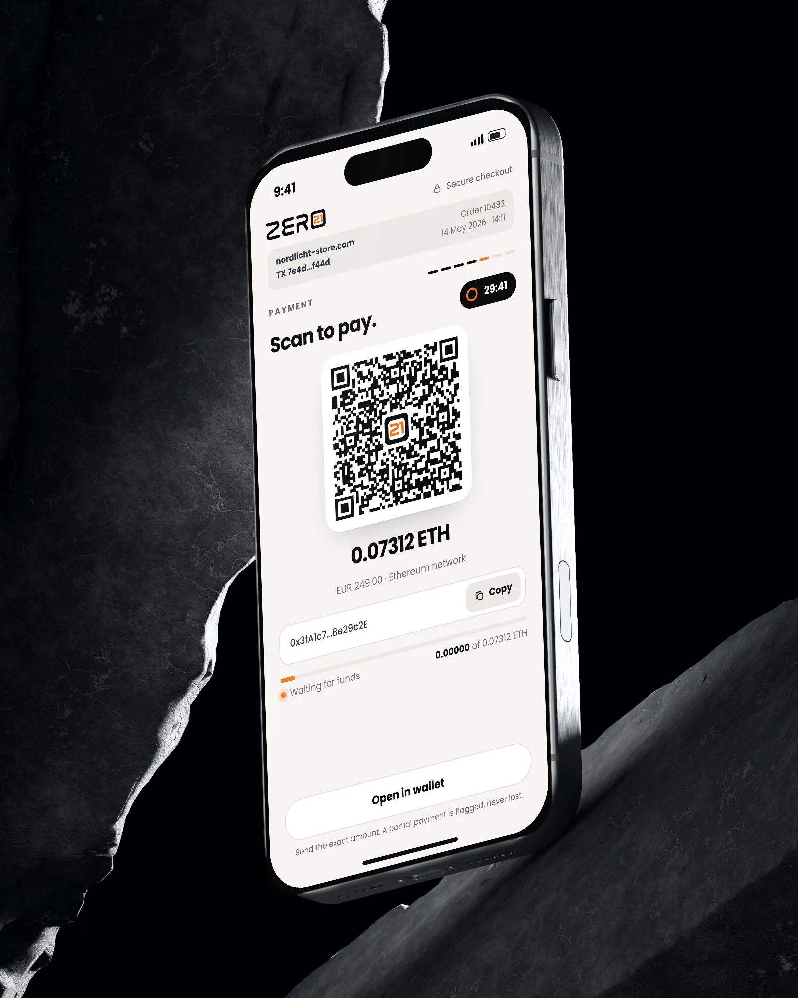 Phone leaning on dark stone showing the payment method screen
